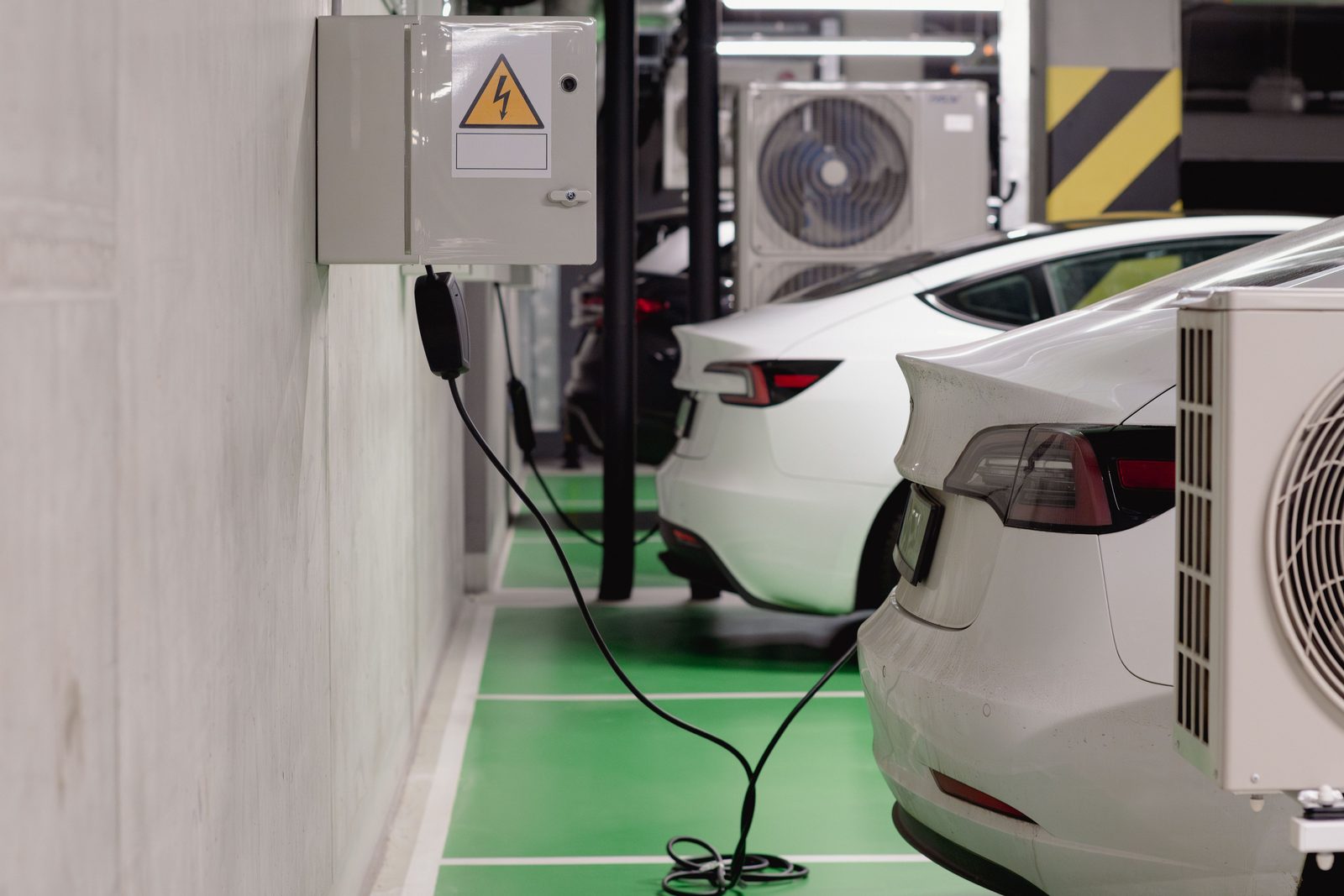 Electric vehicles charging from wall mounted units in an underground car park